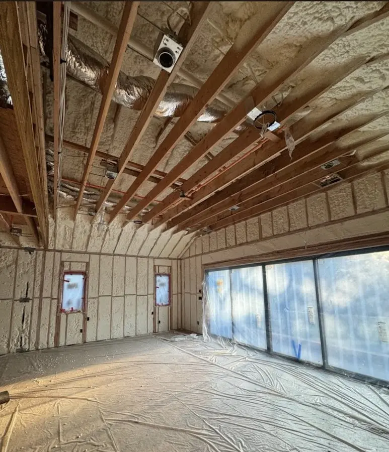 Interior walls and ceiling insulated with spray foam during new construction in Clear Lake